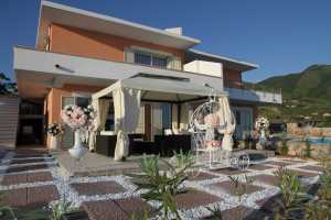 Seafront vacation villa rental with amazing view of Mediterranean sea at Praia a Mare. This holiday seafront villa has 6 bedrooms and 9 bathrooms 6