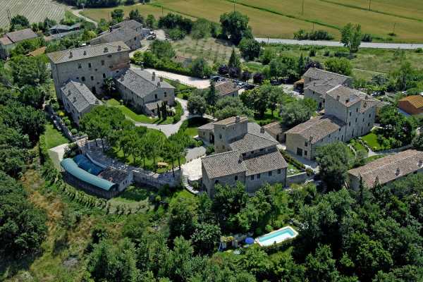 8 Exclusive vacation rentals apartments and 8 suites near Perugia in Umbria. This restored residence with pool and chapel is perfect for weddings